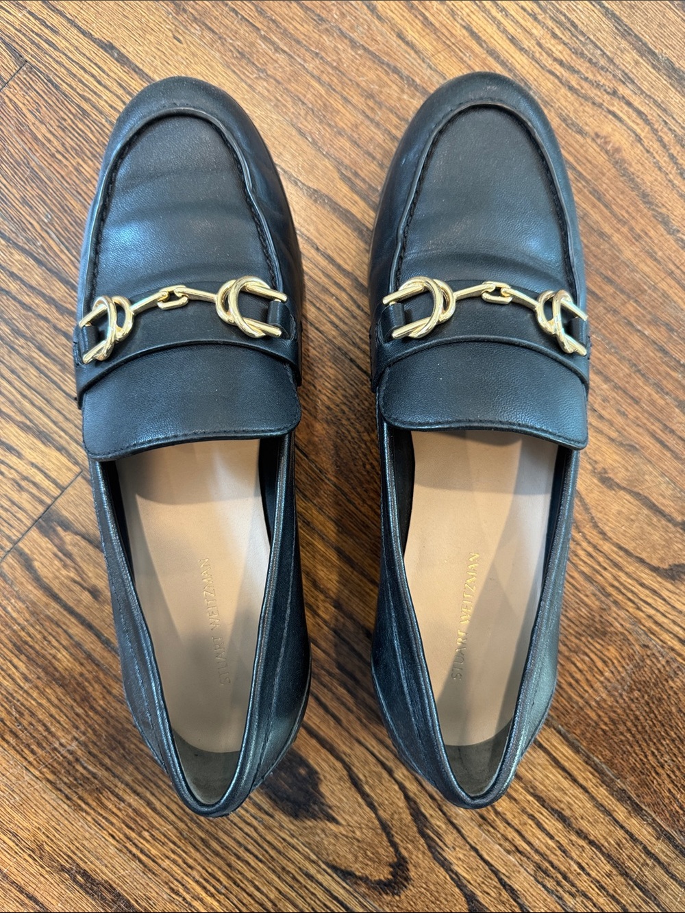 Stuart Weitzman Black Leather Women's Loafers with Gold Bit Accent